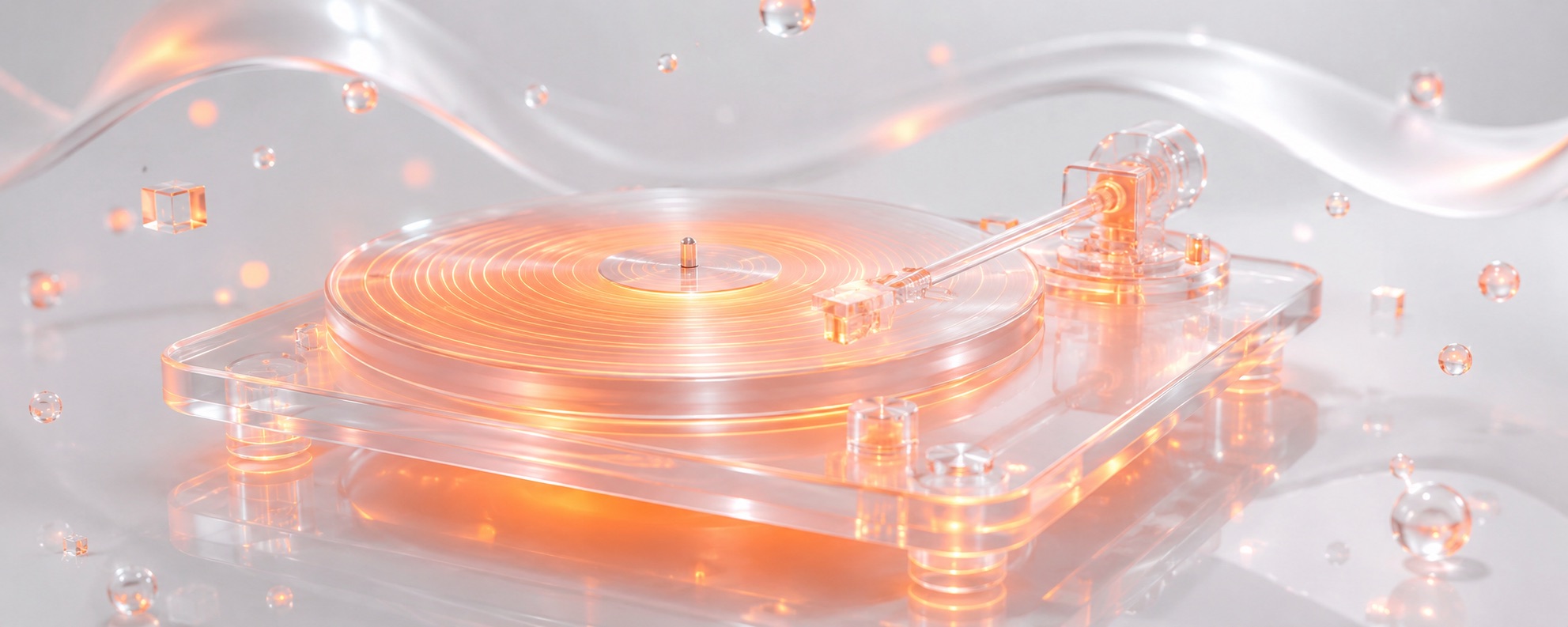 Disque vinyle en verre dépoli translucide tournant sur sa platine, dont le sillon en spirale irradie une lueur orange